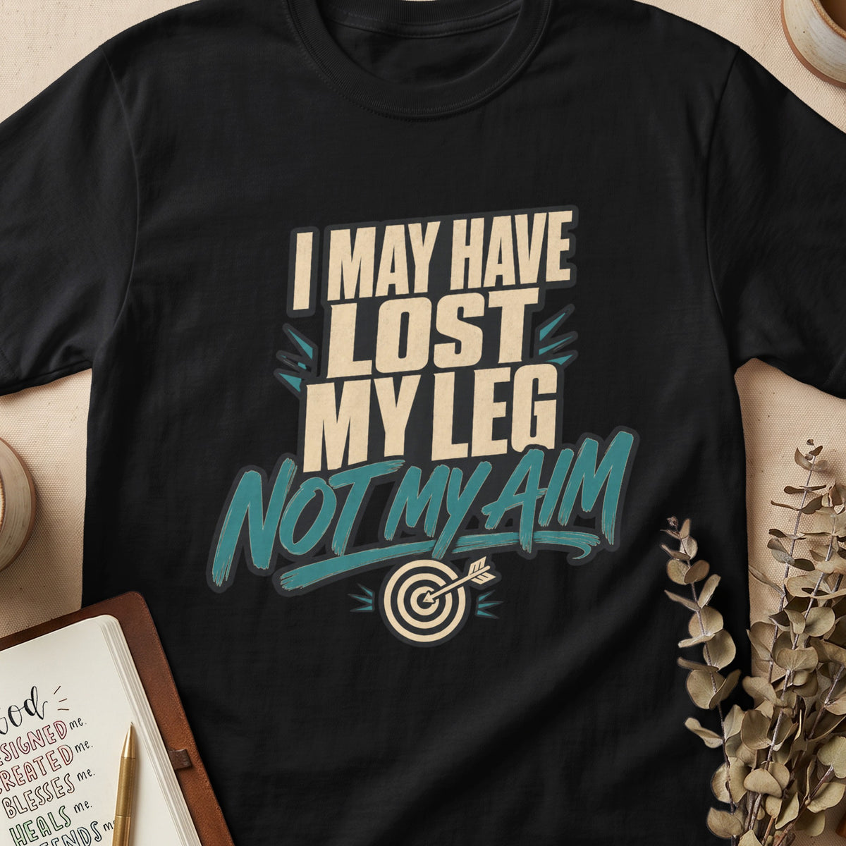 Black t-shirt with text "I MAY HAVE LOST MY LEG NOT MY AIM" and a dartboard.