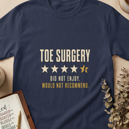 Navy t-shirt with "TOE SURGERY" and a bad review.