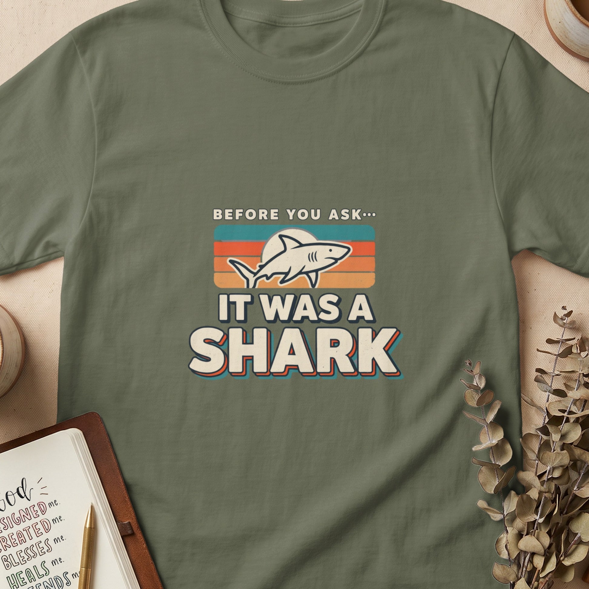 T-shirt with retro graphic: "BEFORE YOU ASK... IT WAS A SHARK".