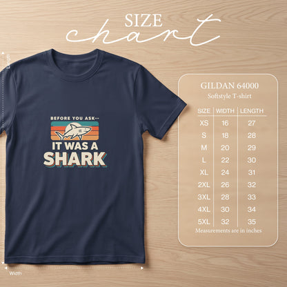Navy t-shirt with "Before You Ask... It Was A Shark" graphic and Gildan size chart.