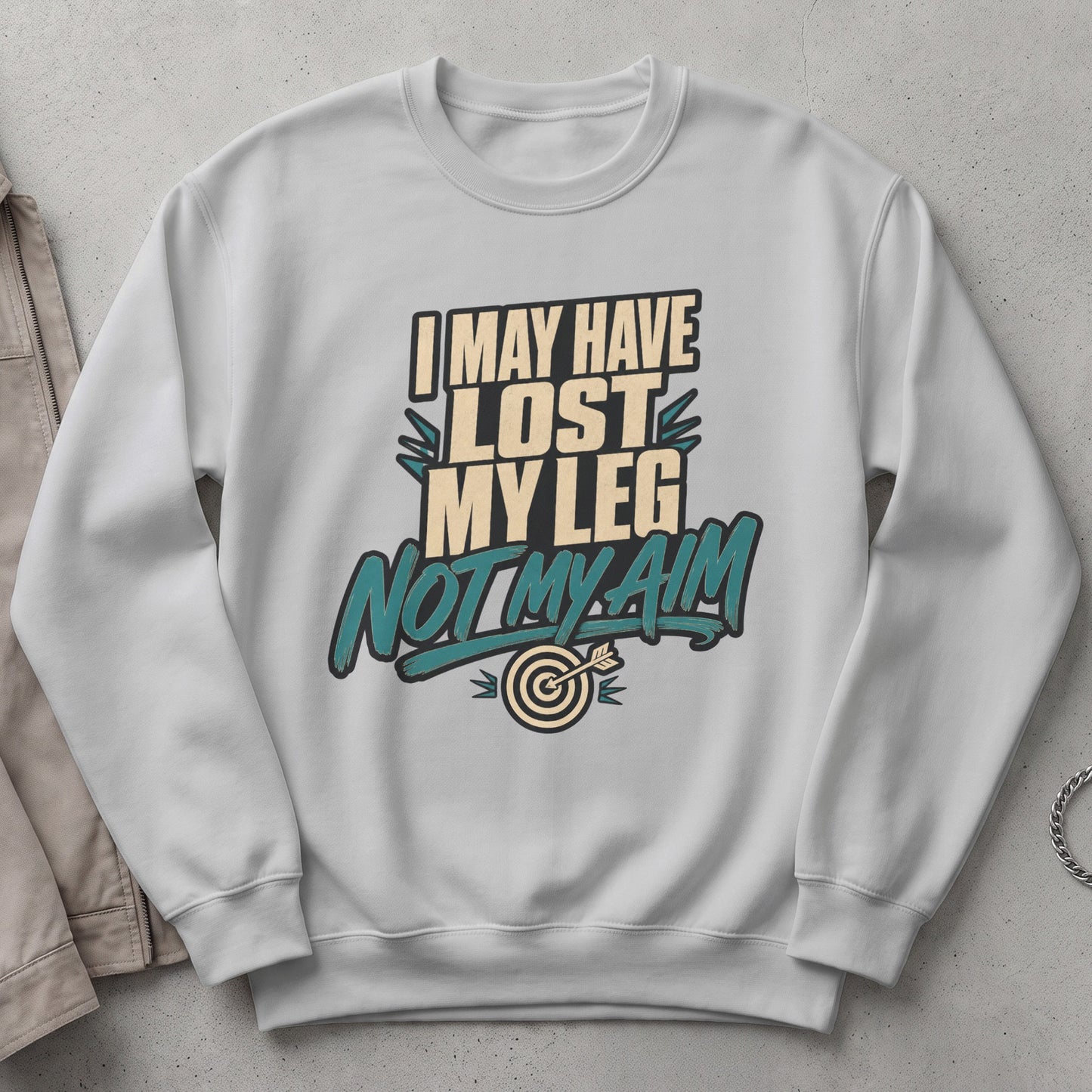 White sweatshirt with text: "I MAY HAVE LOST MY LEG NOT MY AIM" and a dartboard graphic.