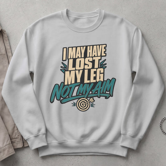 White sweatshirt with text: "I MAY HAVE LOST MY LEG NOT MY AIM" and a dartboard graphic.