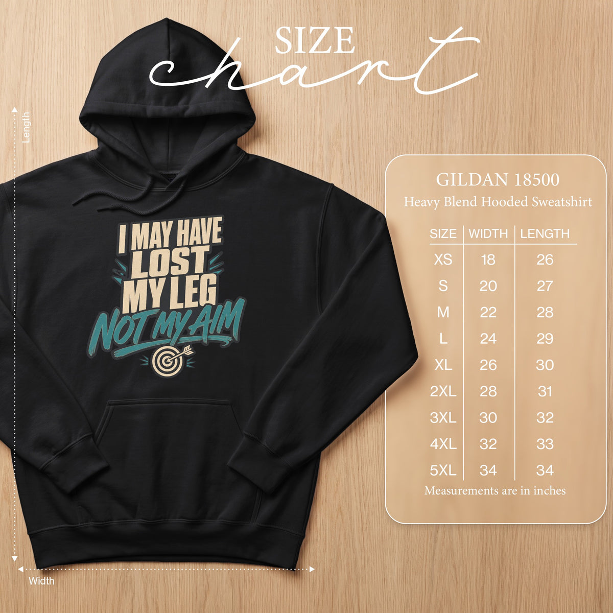 Black Gildan 18500 hoodie with "I may have lost my leg, not my aim" graphic and size chart.