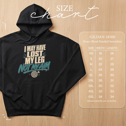 Black Gildan 18500 hoodie with "I may have lost my leg, not my aim" graphic and size chart.