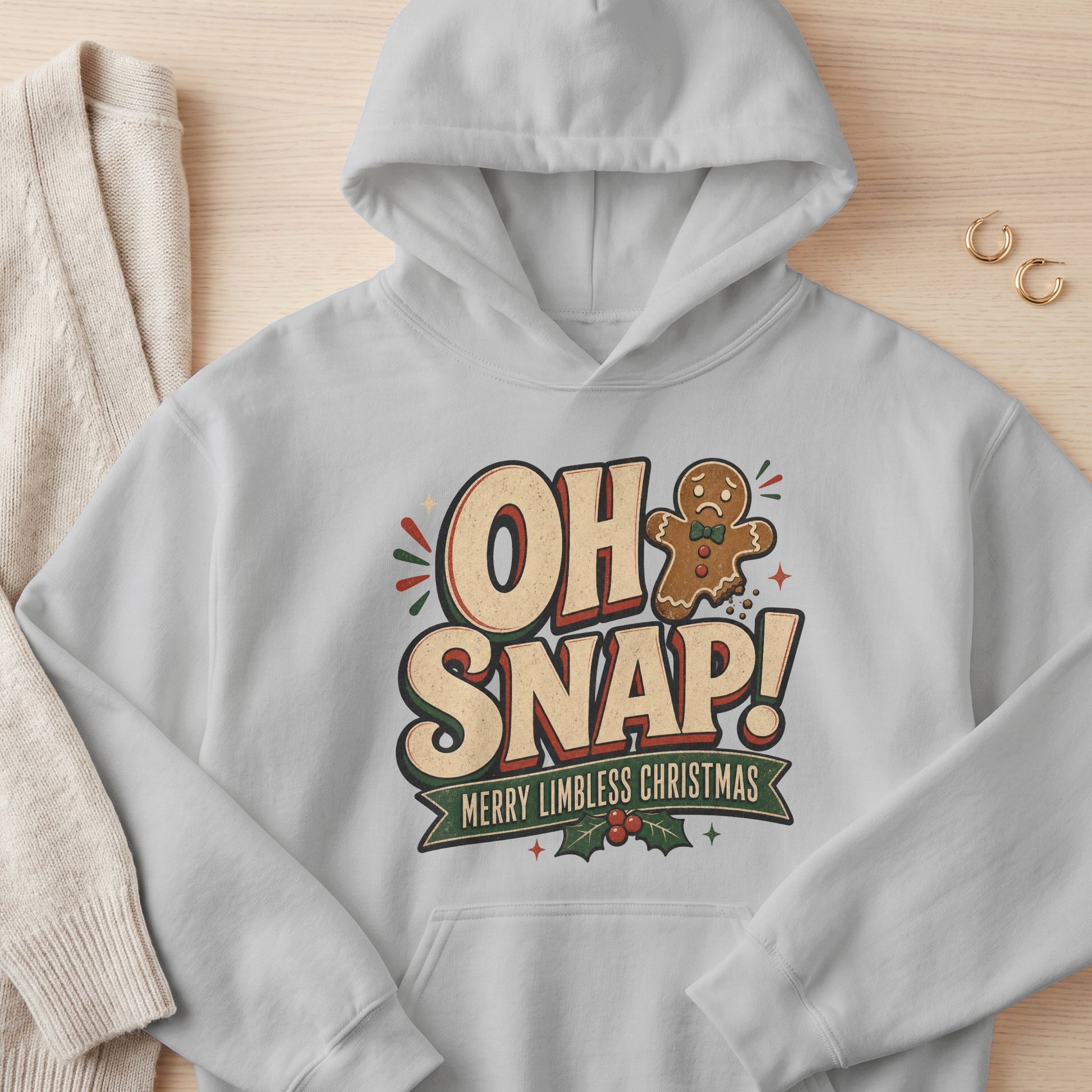 Gray hoodie with "OH SNAP! Merry Limbless Christmas" text and a gingerbread man.