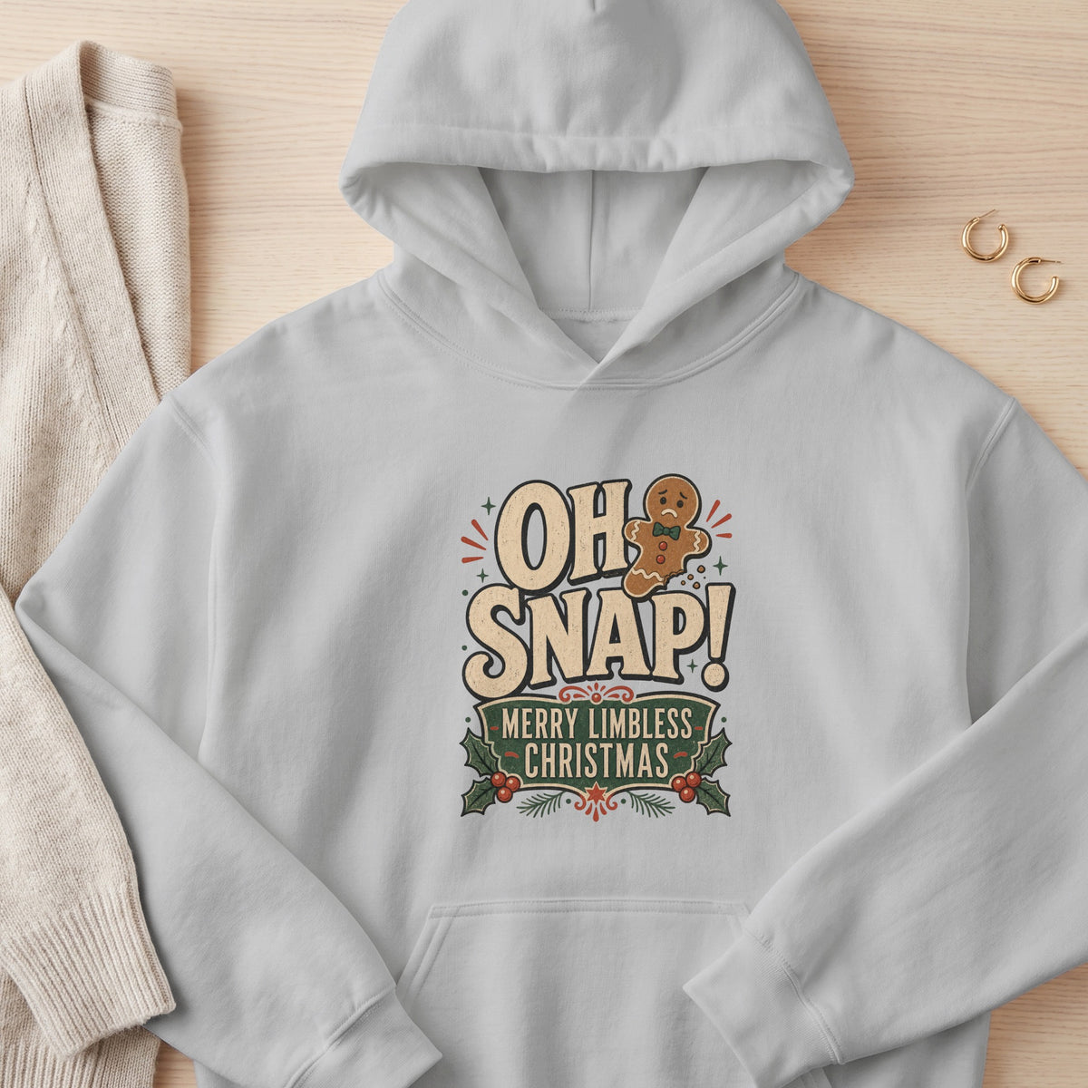 Light gray hoodie with gingerbread man saying "OH SNAP! Merry Limbless Christmas."