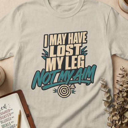 T-shirt with text "I MAY HAVE LOST MY LEG NOT MY AIM" and a dartboard.