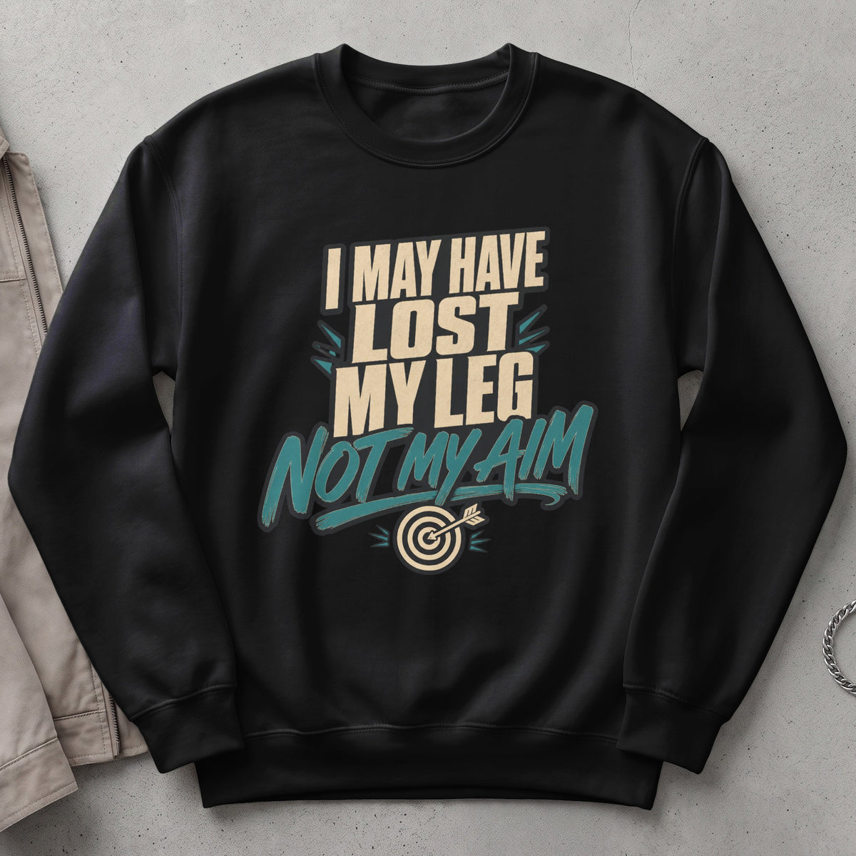 Black sweatshirt with text "I MAY HAVE LOST MY LEG NOT MY AIM" and a dartboard graphic.