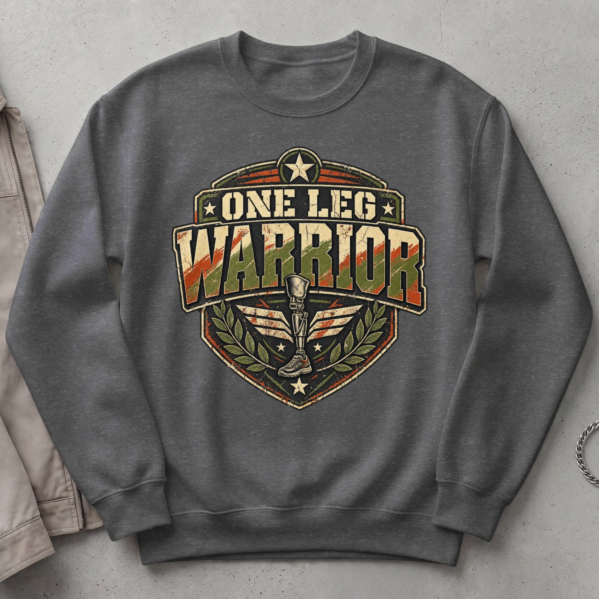 Gray sweatshirt with "One Leg Warrior" text and prosthetic leg graphic.