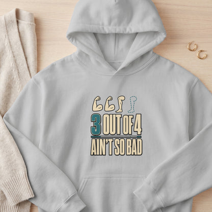 Gray hoodie with "3 OUT OF 4 AIN'T SO BAD" text and muscular arm graphics.