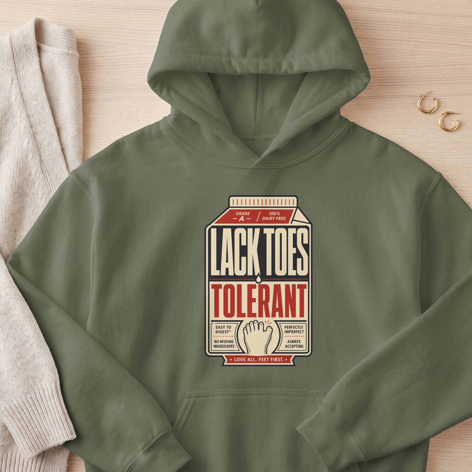 Green hoodie with "Lack Toes Tolerant" design resembling a milk carton.