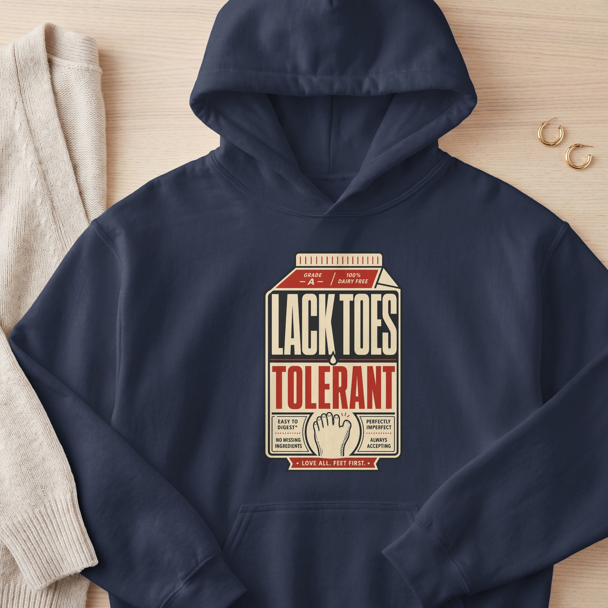 Navy hoodie with "Lack Toes Tolerant" text and foot graphic, like a milk carton.