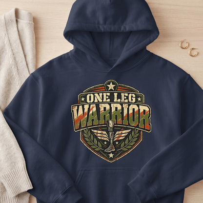 Navy hoodie with distressed "One Leg Warrior" shield graphic featuring a prosthetic leg.