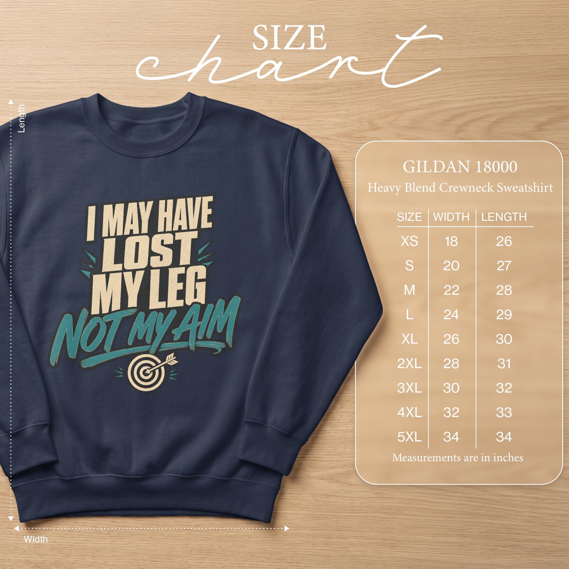 Navy sweatshirt with text "I MAY HAVE LOST MY LEG NOT MY AIM" and size chart.