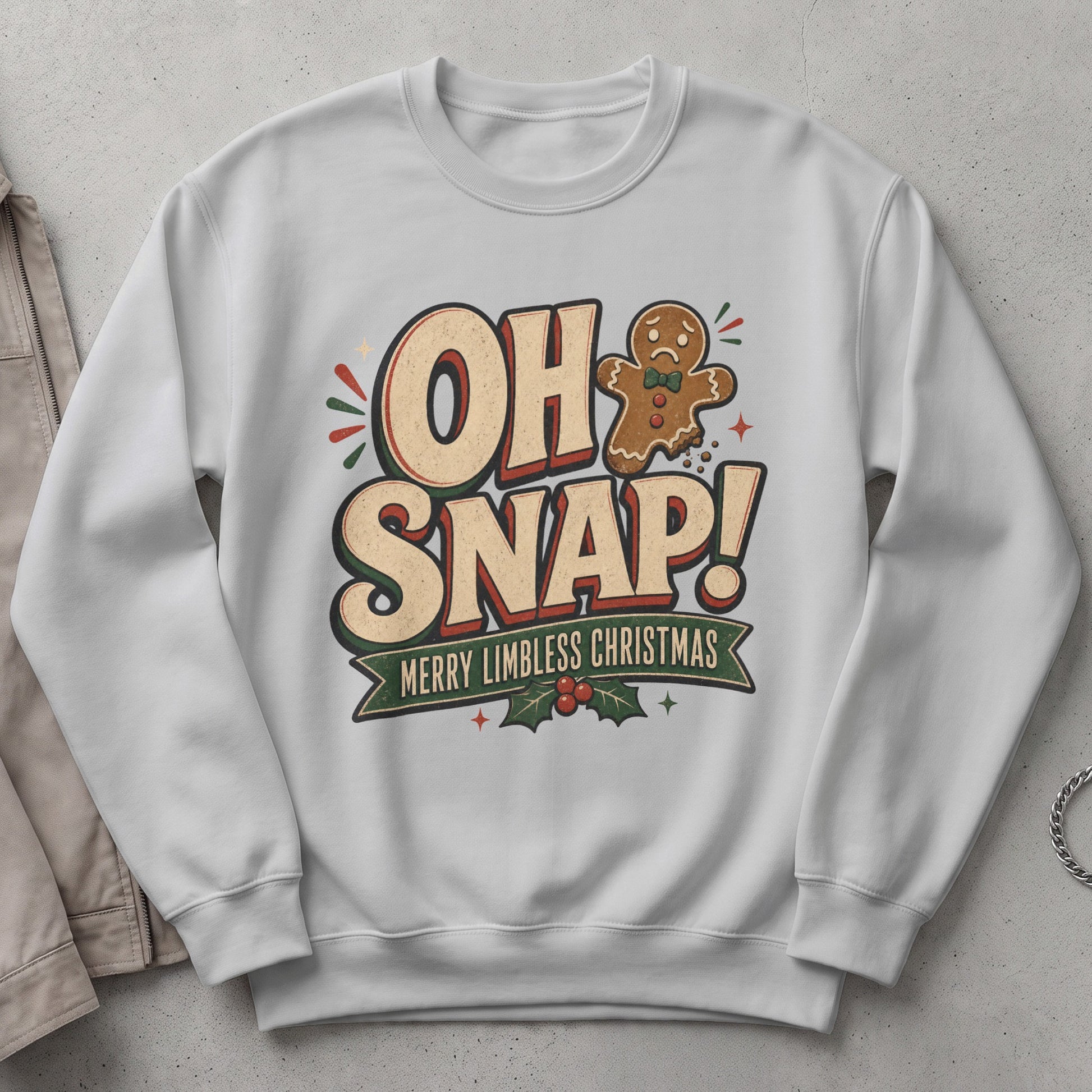 White sweatshirt with "OH SNAP! MERRY LIMBLESS CHRISTMAS" text and sad gingerbread man.