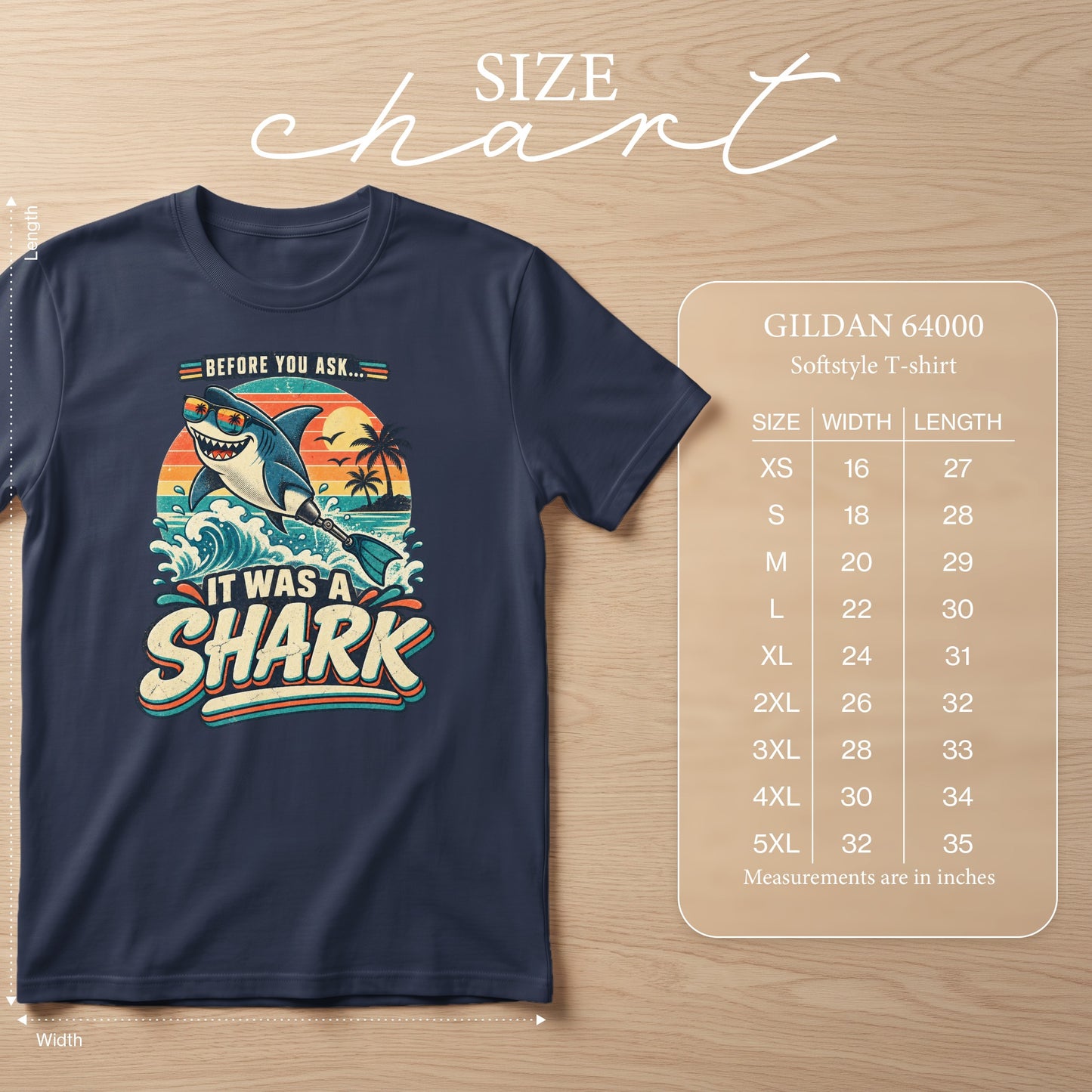 Navy t-shirt with "It was a shark" graphic and Gildan size chart.